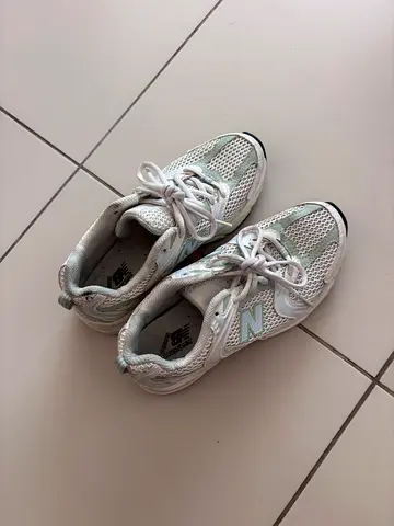 White New Balance running shoes, lightly used