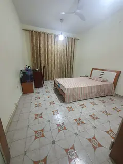 Spacious room with balcony for rent in Karama
