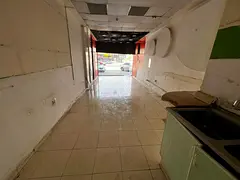 Shop for annual rent on Sheikh Ammar Main Street. Parking available. Large space. Suitable for any c