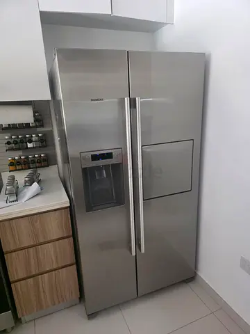 Siemens side by side fridge and freezer new model slightly used with ice maker