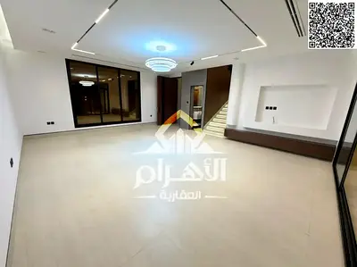 A luxurious 5-bedroom villa spread over two floors and a rooftop terrace, located in a prime locati