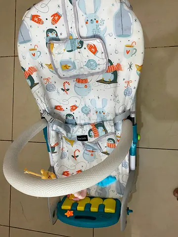 Baby bouncer/rocker with toy bar - gently used