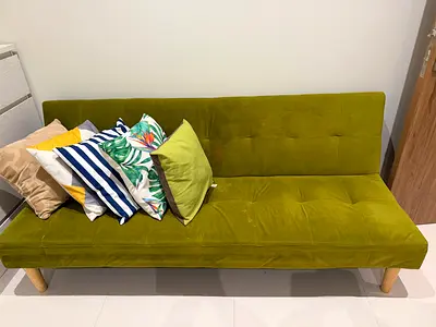 Green velvet sofa bed