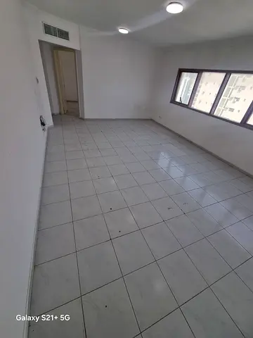 For rent in Sharjah Al Majaz 2 one bedroom apartment with hall one bathroom spacious owner paid AC for employees only annual rent AED 38500 four or si