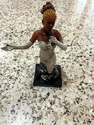 Vintage female figurine/mermaid-style statue on base
