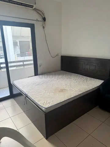 King wooden bed frame with mattress