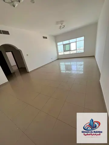**The largest one-bedroom apartment in Al Butina, Sharjah**, featuring a **spacious layout** and a **beautiful open view**. It includes a **large, wel