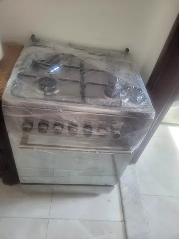 Gas stove with cylinder