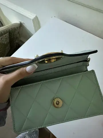Mint green quilted womens wallet - good condition