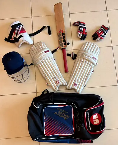 Complete SS cricket kit with bat, pads, gloves, helmet and bag - used