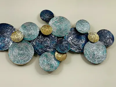 Metal decorative wall art - circular blue silver gold design, ready to hang
