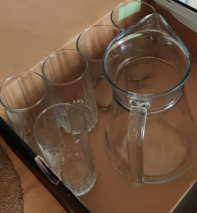 Glass jug and glass set