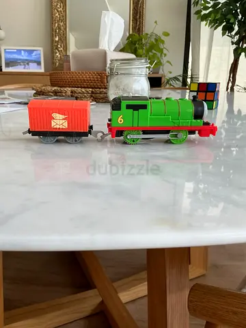 Green toy train engine with cargo wagon (pre-owned)