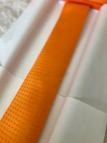 Orange Hermès-style silk tie in excellent condition