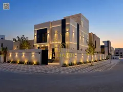 For sale in Al-Haliyo 2, a corner villa with 5 bedrooms, a majlis (formal sitting room), a living ro