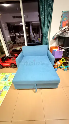 Light blue convertible sofa bed - single to small double, good condition