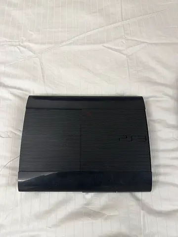 PS3 SUPER SLIM JAILBROKEN + 2 CONTROLLERS