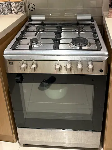 Stainless Steel 4-Burner Gas Cooker with Oven - Good Working Condition