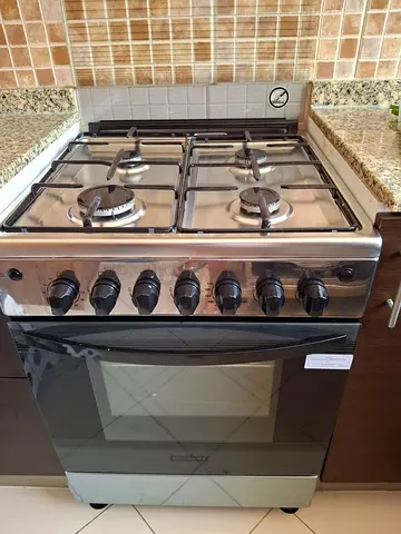 Stainless Steel 4-Burner Gas Range with Oven — Good Condition