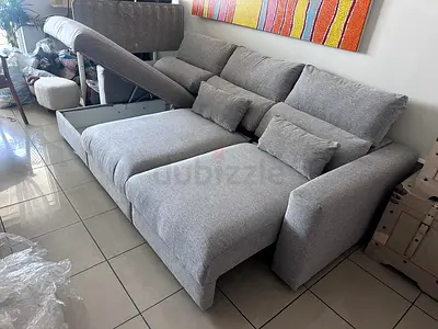 Eskilstuna L shape sofa bed with storage