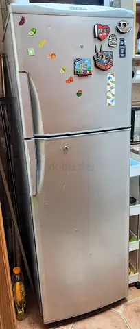 Silver Two-Door Refrigerator/freezer - used, working