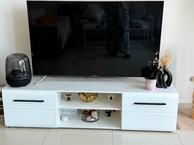 White low TV cabinet with drawers and open shelves