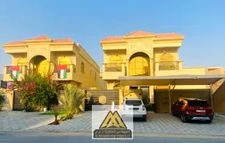 A distinctive villa featuring a modern design and spacious living areas, with a guest majlis, a maid