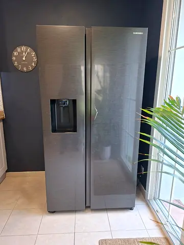 Samsung refrigerator latest model same like new condition