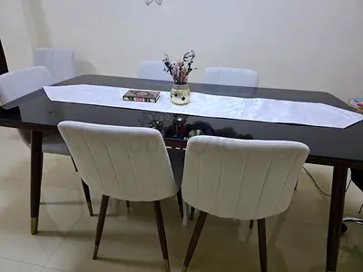 8-Seater Dark Wood Dining Table with Upholstered Cream Chairs