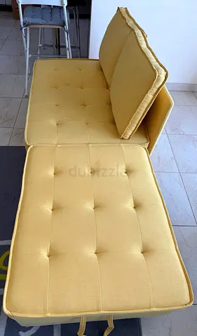 Yellow tufted 2-seater sofa/chaise lounge - good condition