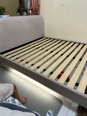 Queen-size upholstered bed slightly used, also with IKEA Vestroy Mattress purchased in Feb 2026.