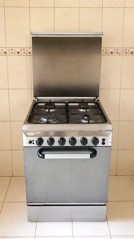 Stainless Steel 4-Burner Gas Cooker with Oven - Good Working Condition