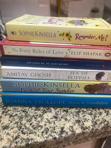 Collection of Mixed Fiction Paperbacks (Sophie Kinsella, Aminatta Forna, Elif Shafak, Amitav Ghosh).