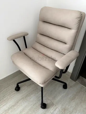 Beige Upholstered Office Chair with Wheels - Good Condition