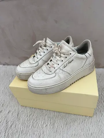 Axel Arigato white trainers