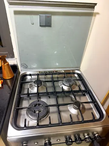 Stainless Steel 4-Burner Gas Stove Cooktop in Good Condition