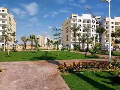 One bedroom and living room, ready within 3 months, 30,000 AED less than the market price, first occupancy, with parking.