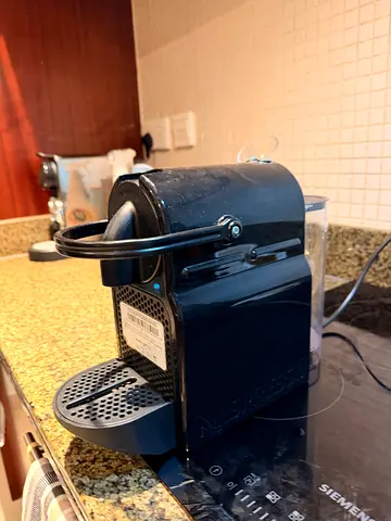 Compact capsule coffee maker (used), works well