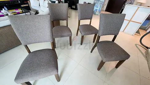 Set of 4 dining chairs - solid wood frames.