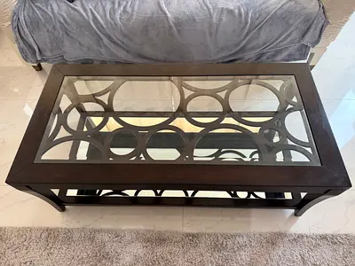 Dark Wood Glass-Top Coffee Table with Decorative Inlay