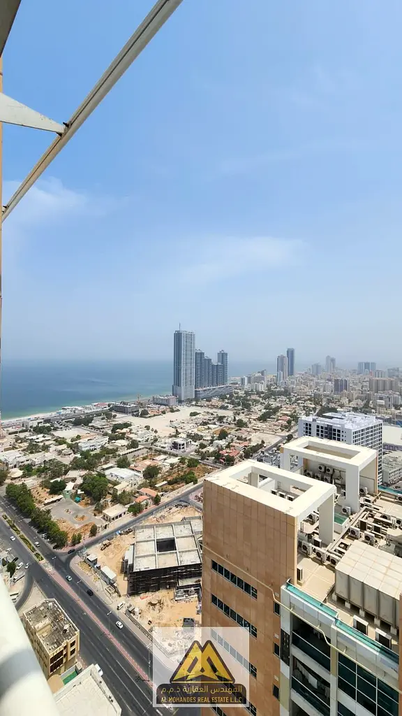 فرصة استثماريه للبيع شقة غرفتين وصالة بإطلالة بحرية جزئية طابق مرتفع بابراج عجمان ون الراشدية3 بجوار جميع الخدمات