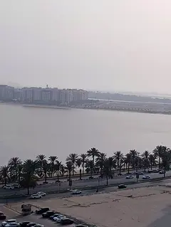 Annual rent in Al Khan Corniche, Sharjah. One bedroom apartment with a spacious living room, kitchen