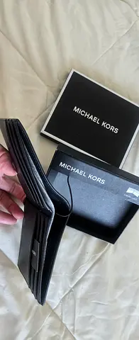 Genuine Michael Kors black leather bi-fold wallet (mens) with box