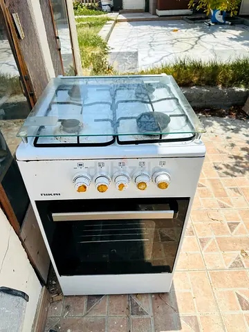 Used Nikai 4-Burner Gas Stove with Oven - Compact, Working Condition
