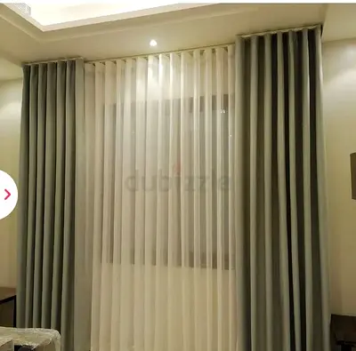 Pair of grey blackout curtains with sheer voile lining - near new