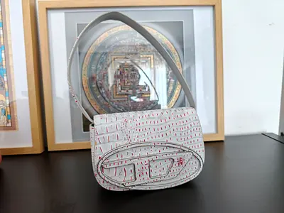 White patterned small shoulder bag — gently used