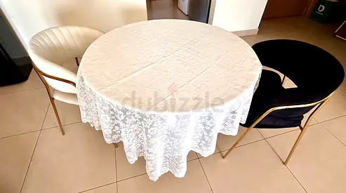Round dining table with two modern velvet chairs — set of 3