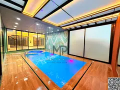 Luxury villa for sale in Al-Raqaib, for UAE nationals only | 6 master bedrooms + swimming pool + jac