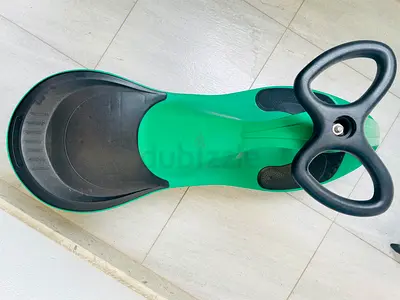Green Plasma Car / Wiggle Ride-On Gyro Car- Good Condition