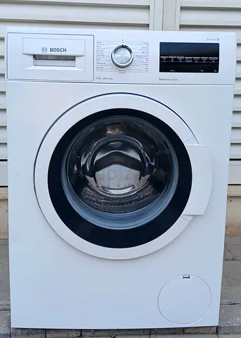 Front Load Bosch 9kg washing machine, color is white, condition is perfect working.